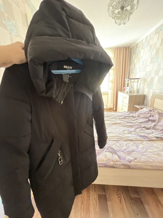 Продам пуховик черного цвета.