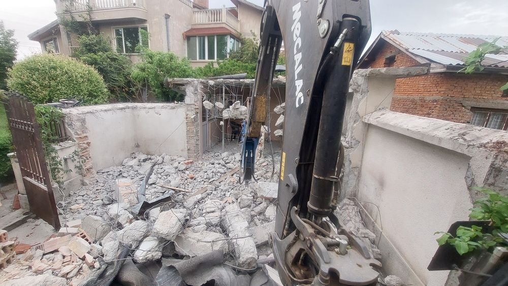 Услуги с комбиниран багер