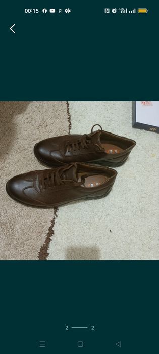 Продам кроссовки кожаные