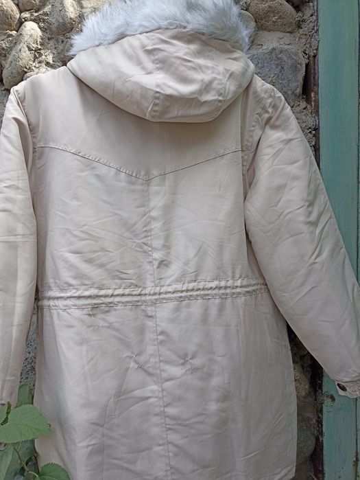 Теплющая женская куртка