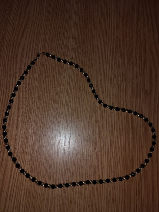 Lanț cu bile de aur