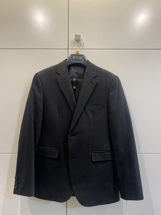 Костюмы и пиджаки