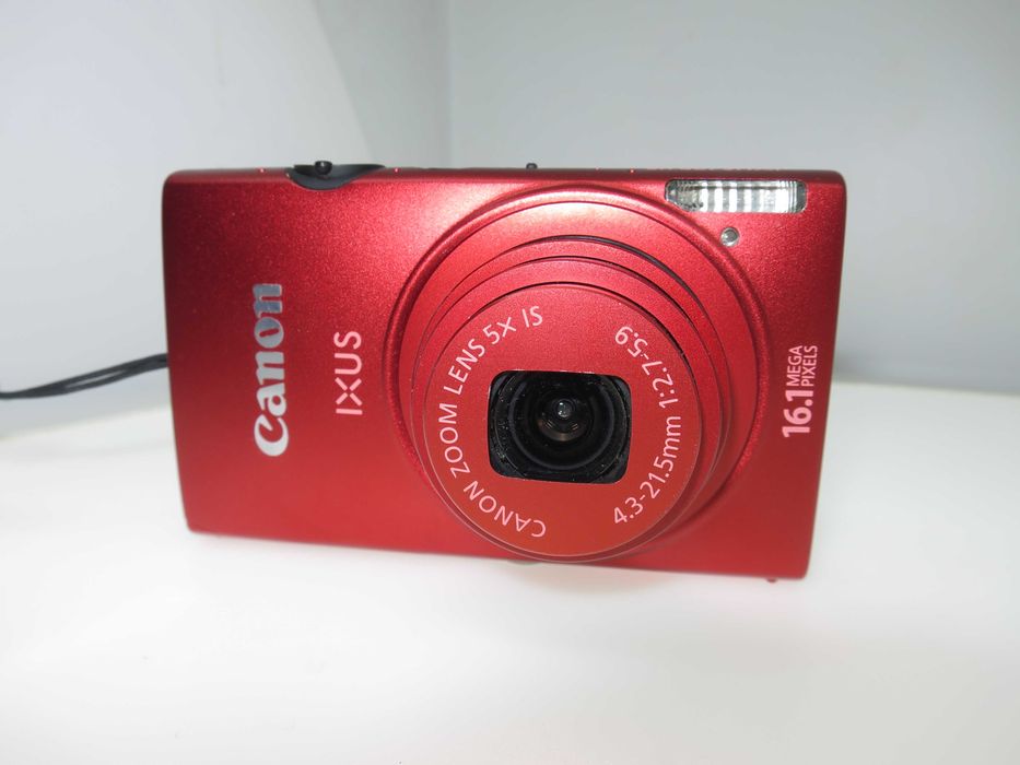Canon IXUS 125 компактен цифров фотоапара в оранжево червен цвят уникат и отлично състояние като НОВ, работи перфектно