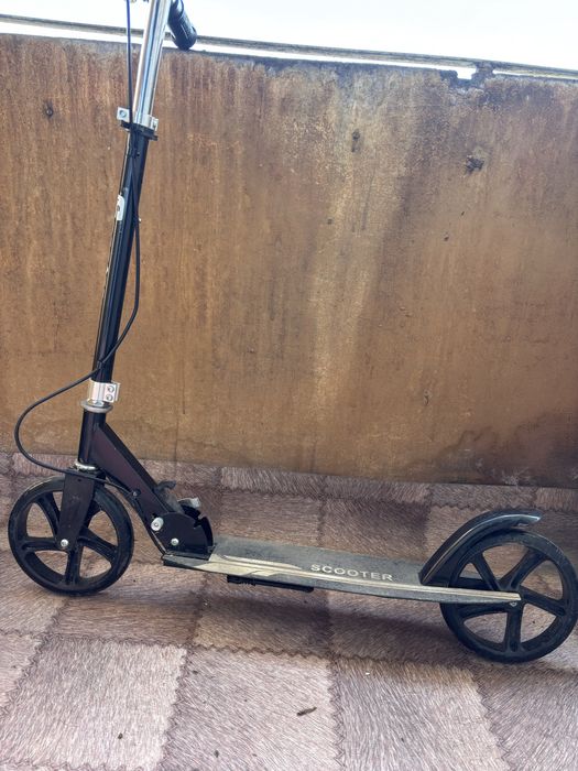 Продам самокат с доской