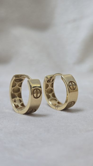 Серьги Cartier за грамм 44000