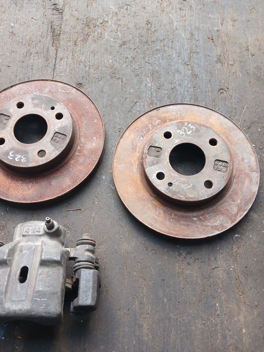 Тормозной диск Мазда 323