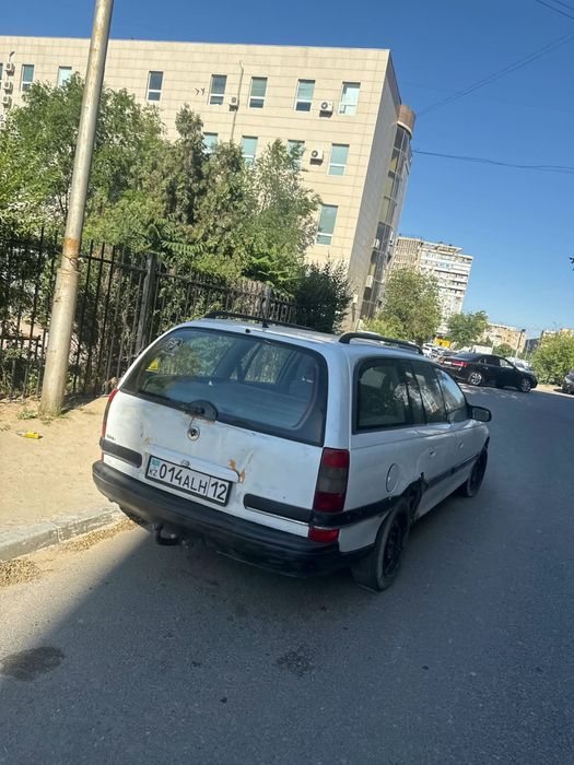 Опел омега универсал