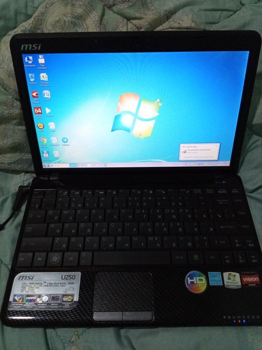 Mini noutbuk sotiladi Yangi