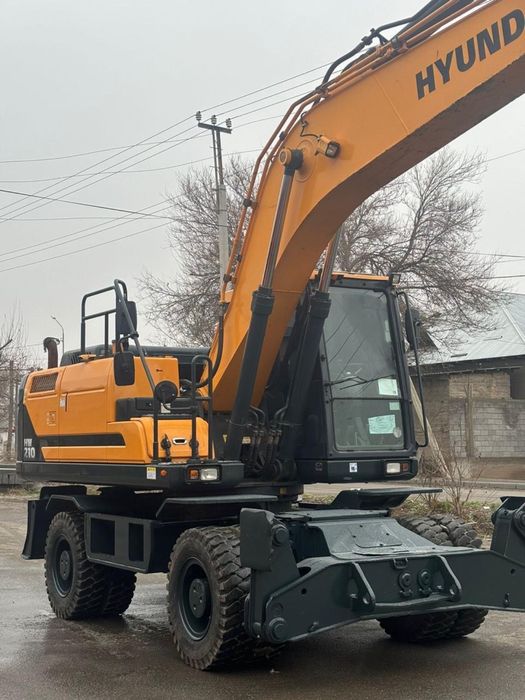 Услуги экскаватора колесного 210