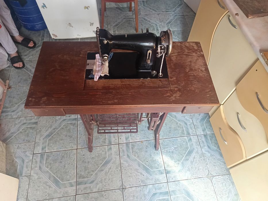 Mașina de cusut  UMC