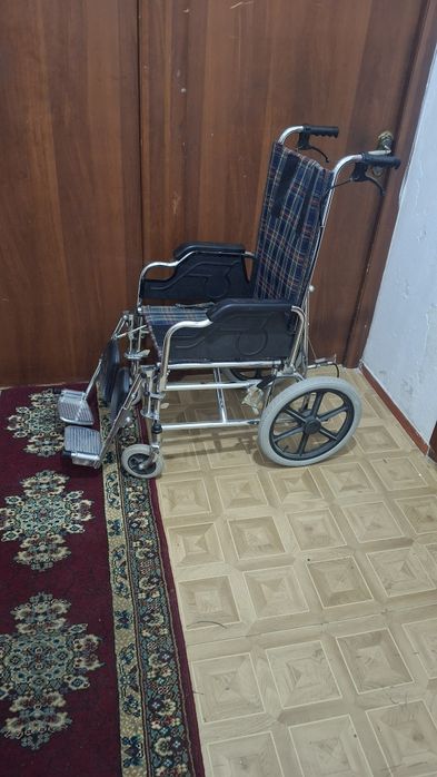 Инвалидная коляска