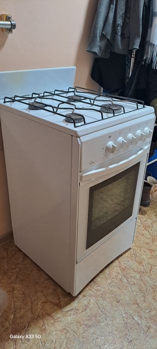 Газ плита в рабочем состояние