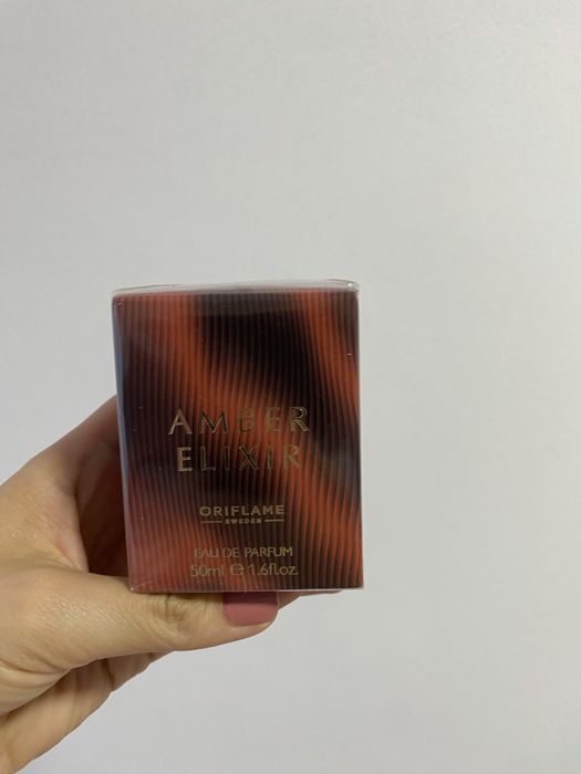 Apa de parfum Amber Elixir