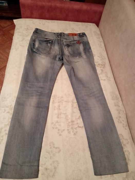 Продам женские джинсы 46