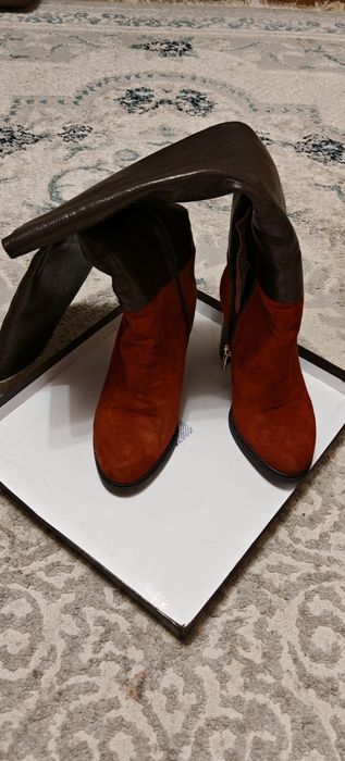 Продам новые сапоги