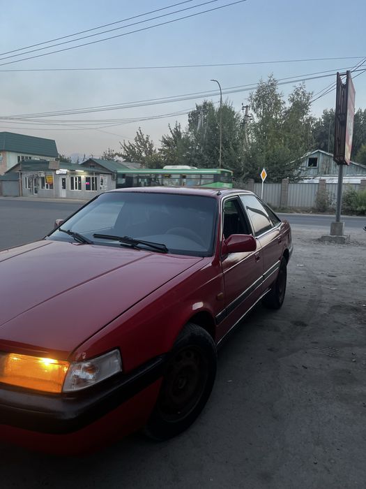 Мазда 626.