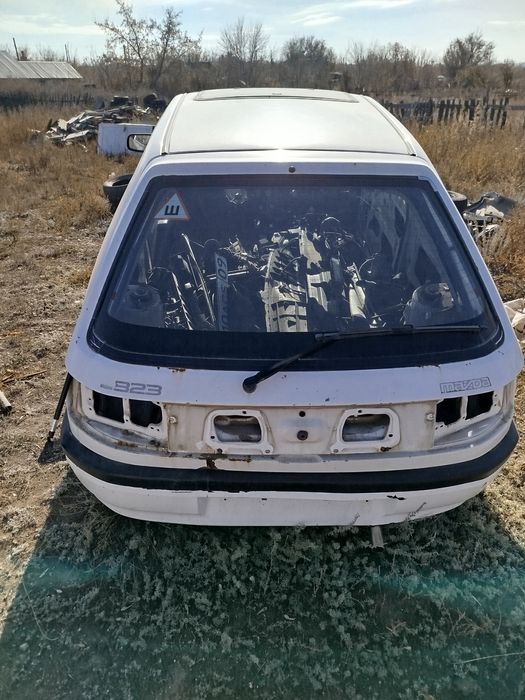Запчасти на мазда 323