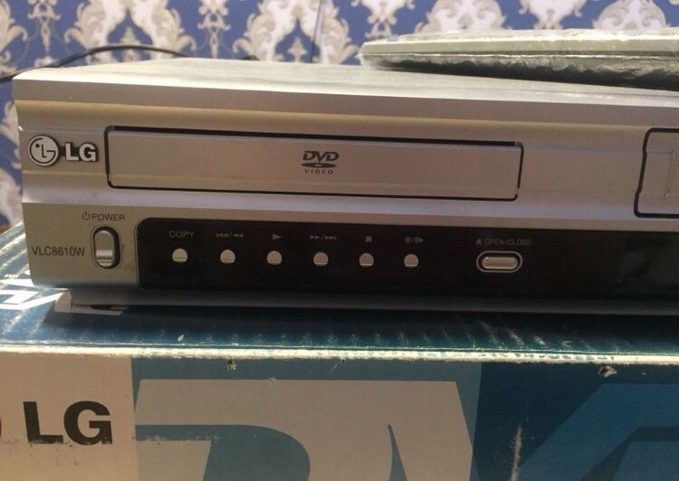 LG (2 в 1) DVD плеер + видеокассета