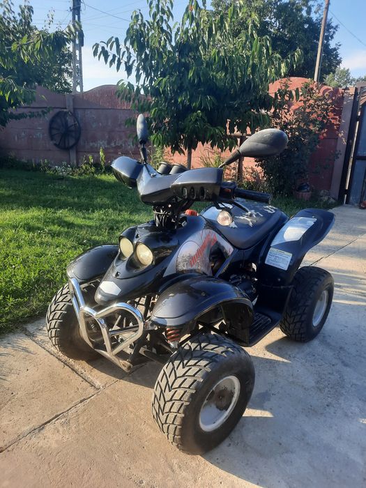 Vand ATV DEFENDER 50 impecabil la SUPER PRET!