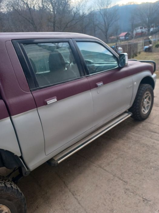 Mitsubishi l200 an 2003