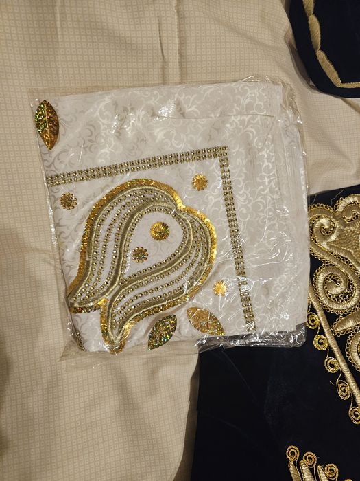 Продается новый чапан золотой