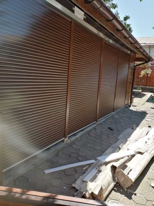 RULOURI Aluminiu si Usi de garaj rezidentiale SECTIONALE