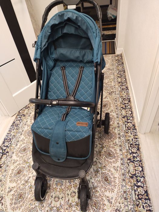 Бала сүйрететін арба. Коляска детский