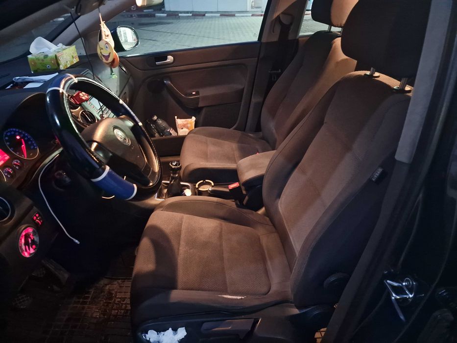 Wv golf 5 plus 1.4 benzina, clima 2 zone, scaune incalzite