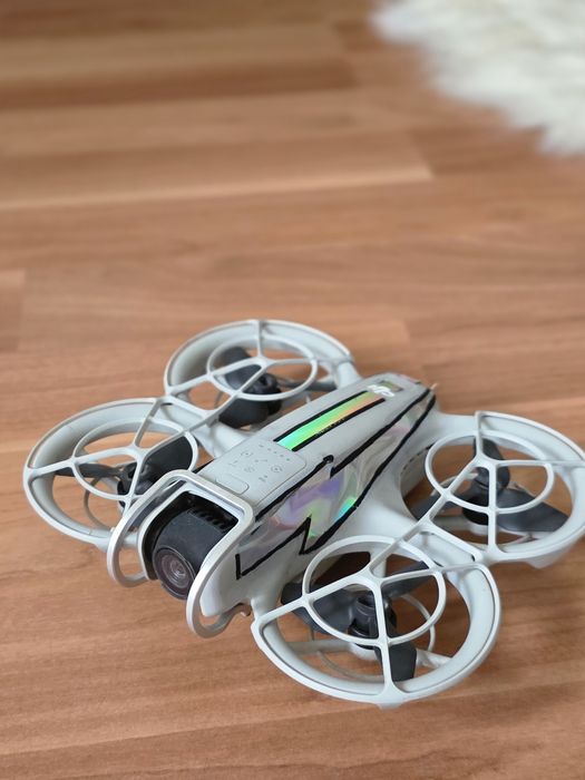 Vând DJI Neo - stare excelentă + protecţie metalică pentru cameră!