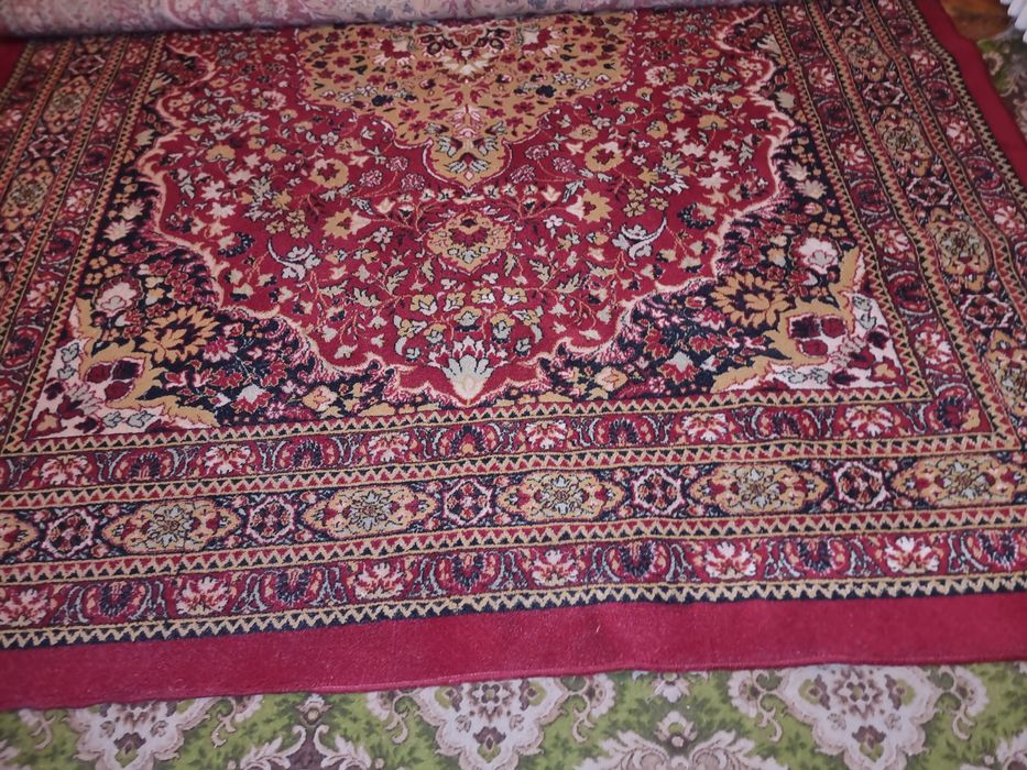 Covor din perjă in stare foarte buna