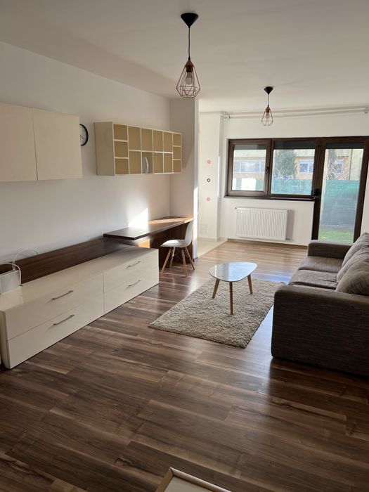 Inchiriez apartament cu gradina si 2 locuri de parcare in curte