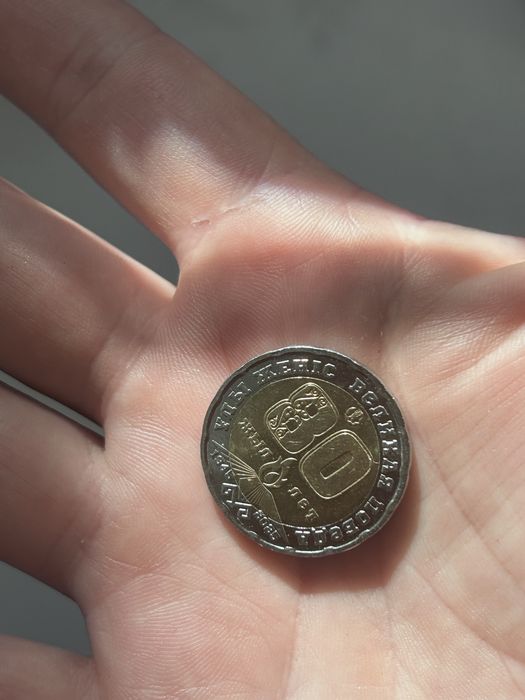 Продам манету 200тг