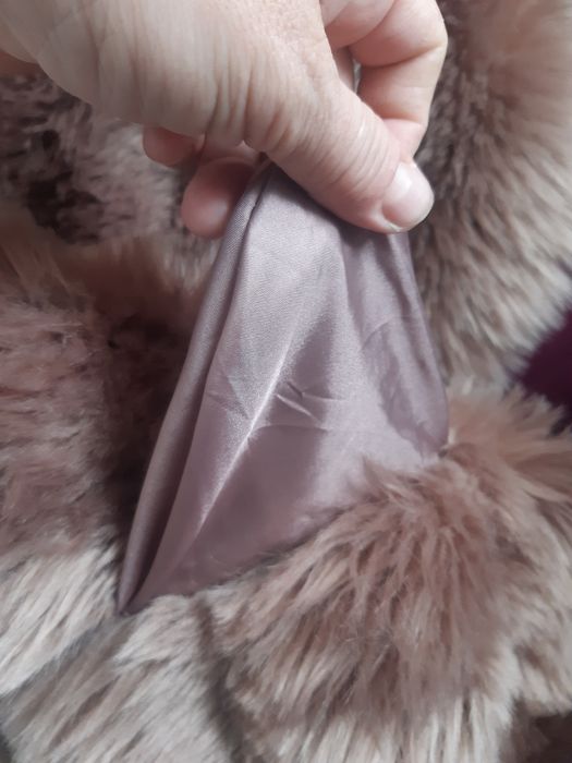 Пухен елек      .