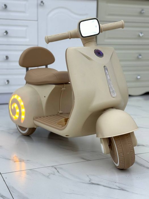 Детский электроскутер, мотоцикл.
Мотоцикл