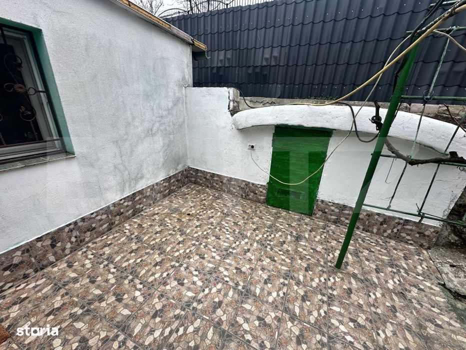 Apartament de locuit + atelier auto + terasa si curte generoasa
