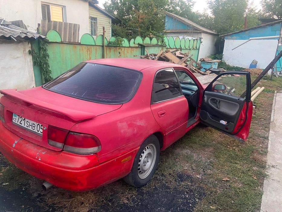 Мазда кронос отличьный автомобиль