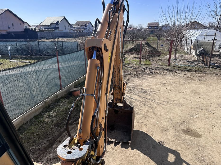 Buldoexcavator CASE 695 super R