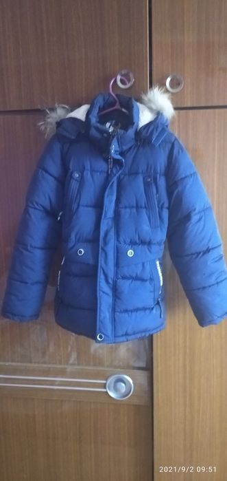 Куртка теплая на Мальчика лет 10