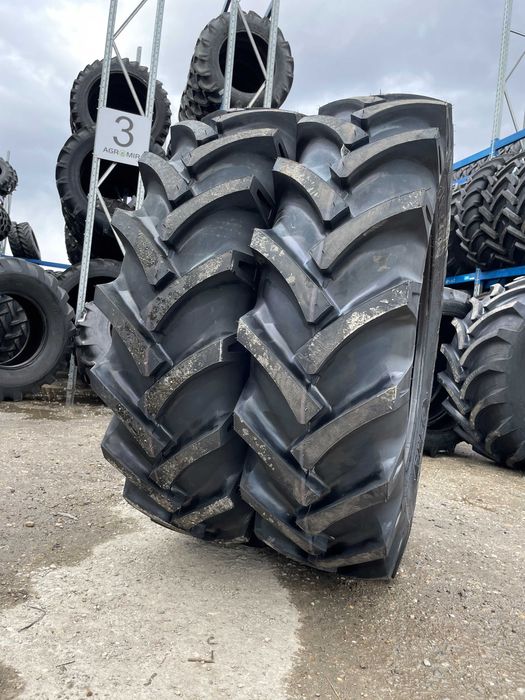 Cauciucuri noi 14.9-30 cu 10 pliuri marca OZKA pentru tractor spate