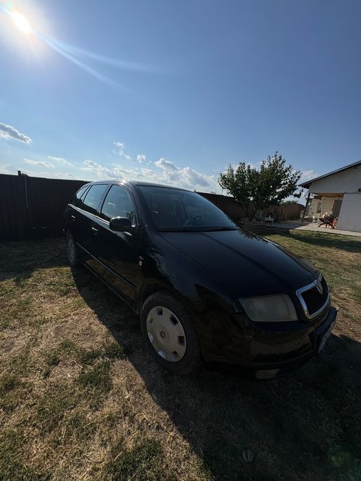 Vând sau sxhimb scoda fabia  cu acte valabila