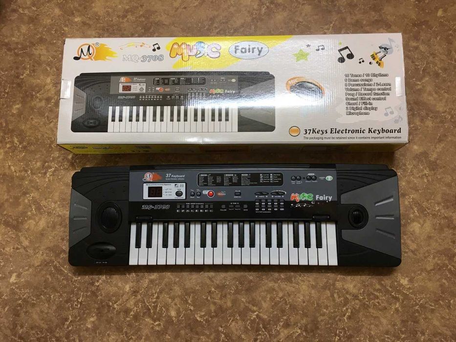 Отличный подарок ребенку детский музыкальный синтезатор