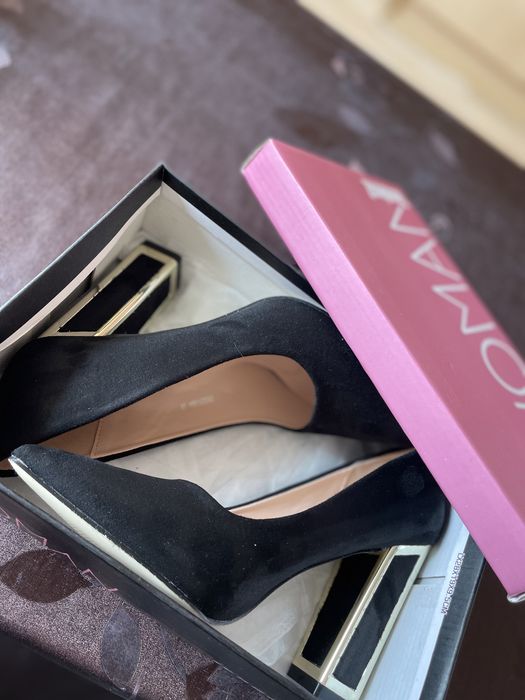 Високи обувки на ток