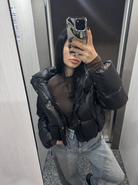 Geca cu implutura din puf de rata