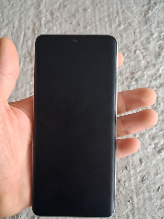 Xiaomi HyperOS ..