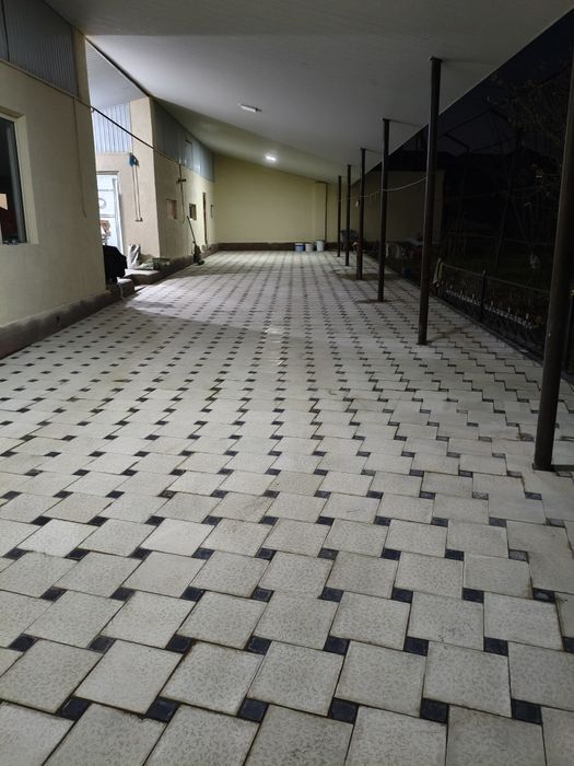 Укладка брусчатки, тротуарной плитки.