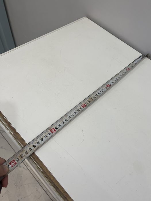 Камод под телевизором .