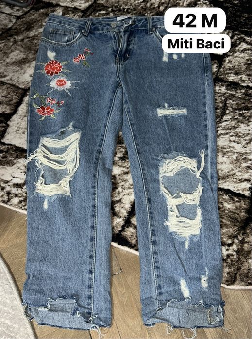 Vând pantaloni lungi