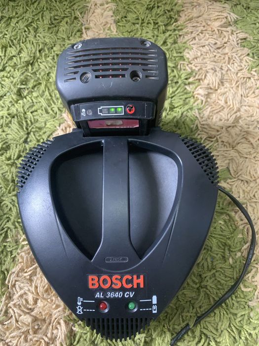 BOSCH set  incarcator + baterie folosite putin