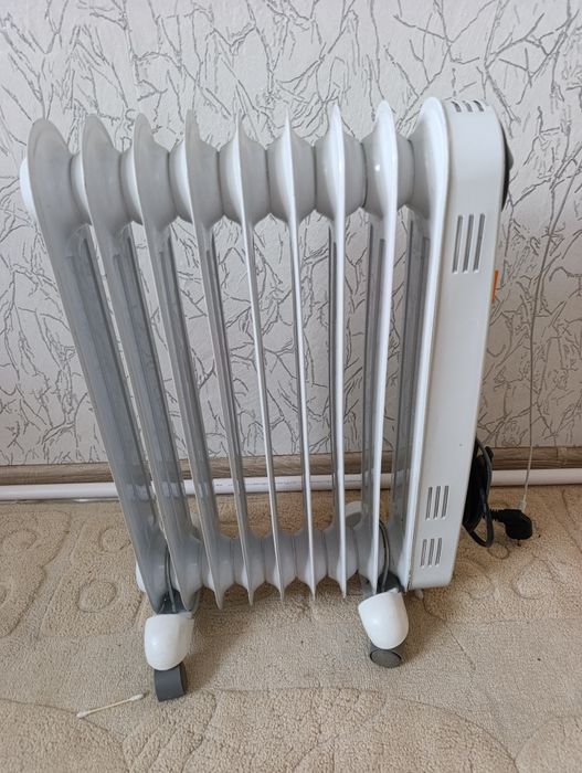 Масляный обогреватель