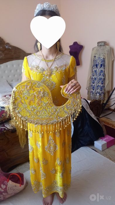 Milliy ko‘ylak ishton.Juda chiroyli,1 marta kiyilgan ,dastro‘mol